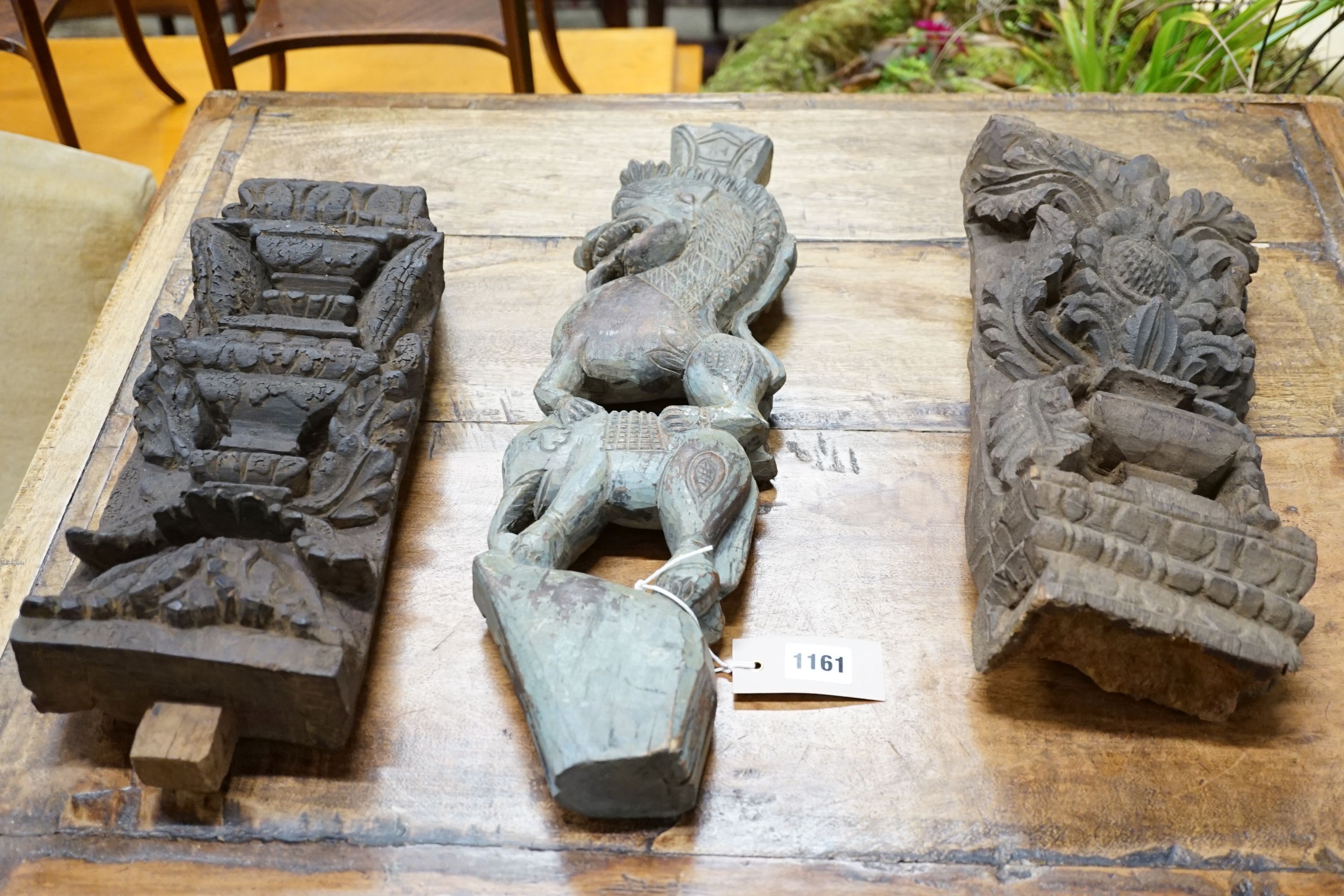 Three assorted Indian hardwood carvings, largest 48cm